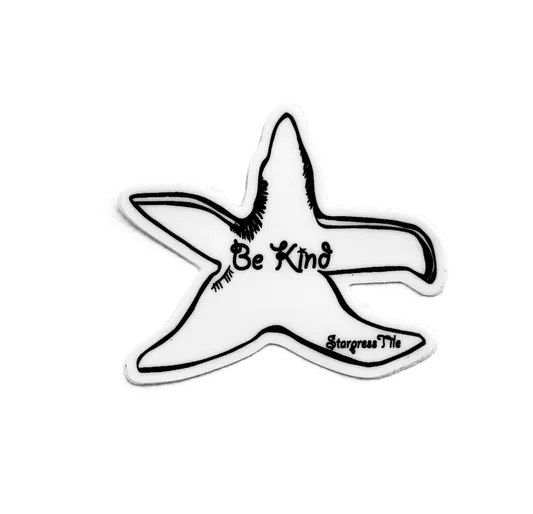 Starfish-shaped tile features the text "Be Kind" in a playful font, promoting positivity and kindness. Ideal for decor or as a thoughtful gift.