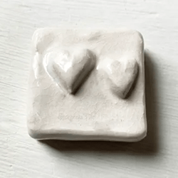 White double heart ceramic art tile.