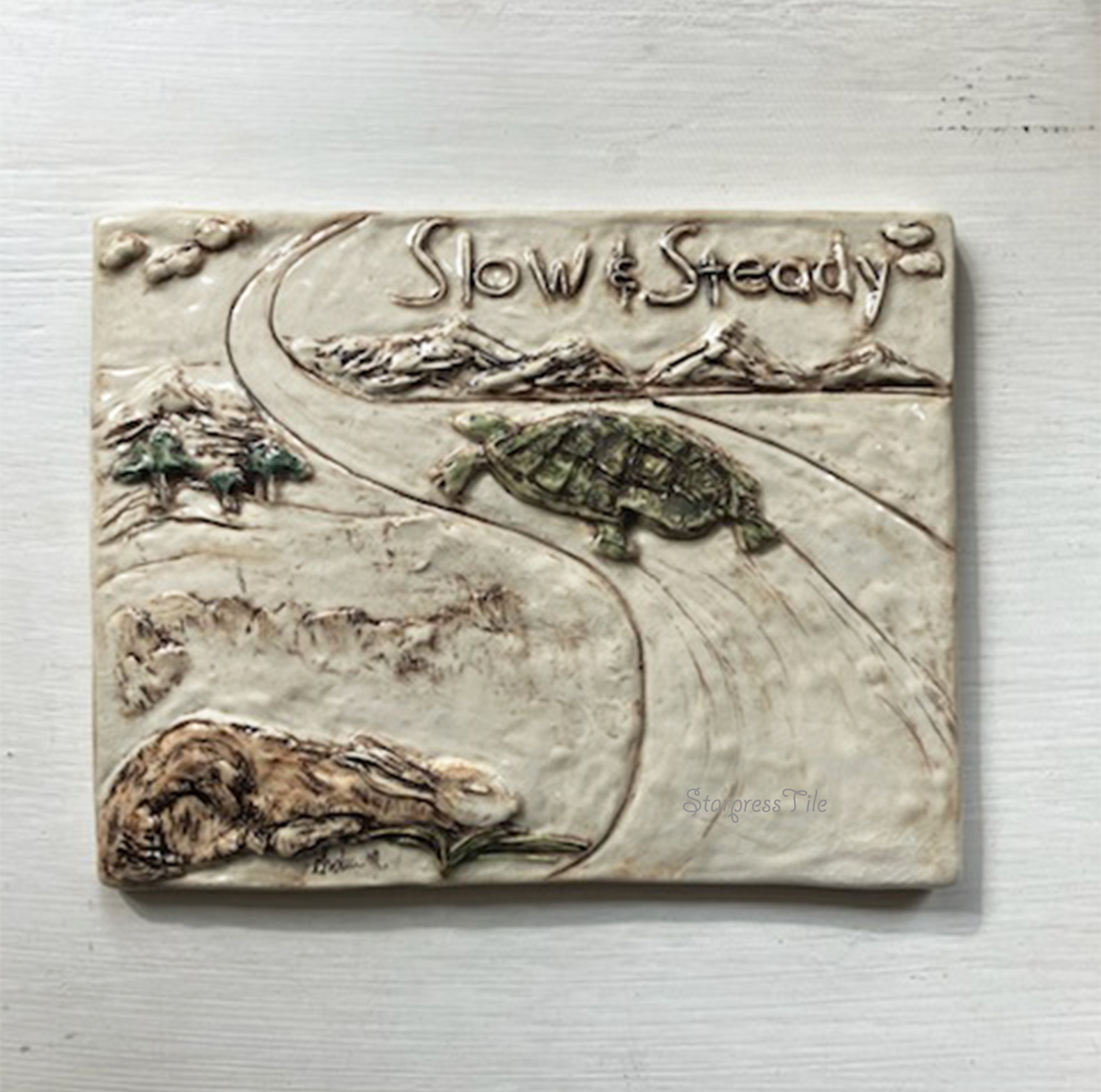 Tortoise and the Hare Ceramic Wall Art. Sleeping hare and walking tortoise.